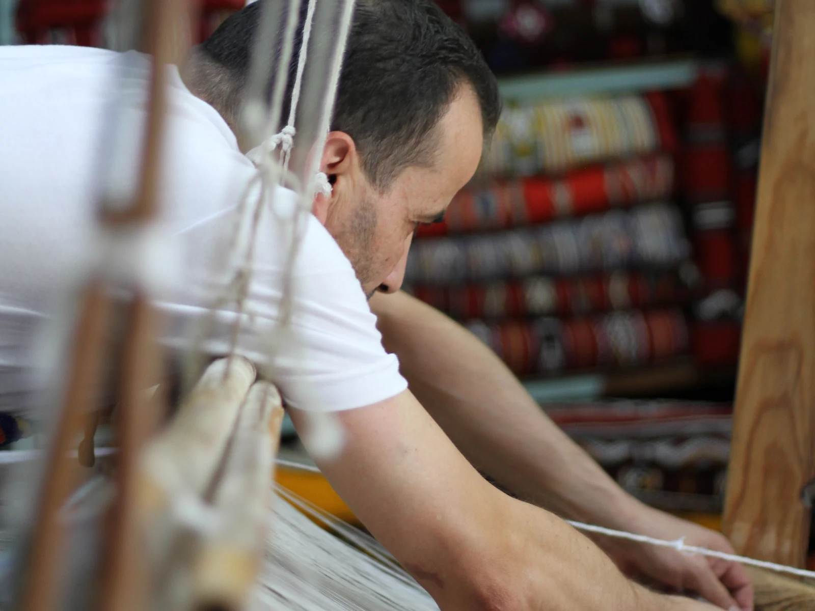 Rachid Chliah weaving at his loom in Chefchaouen